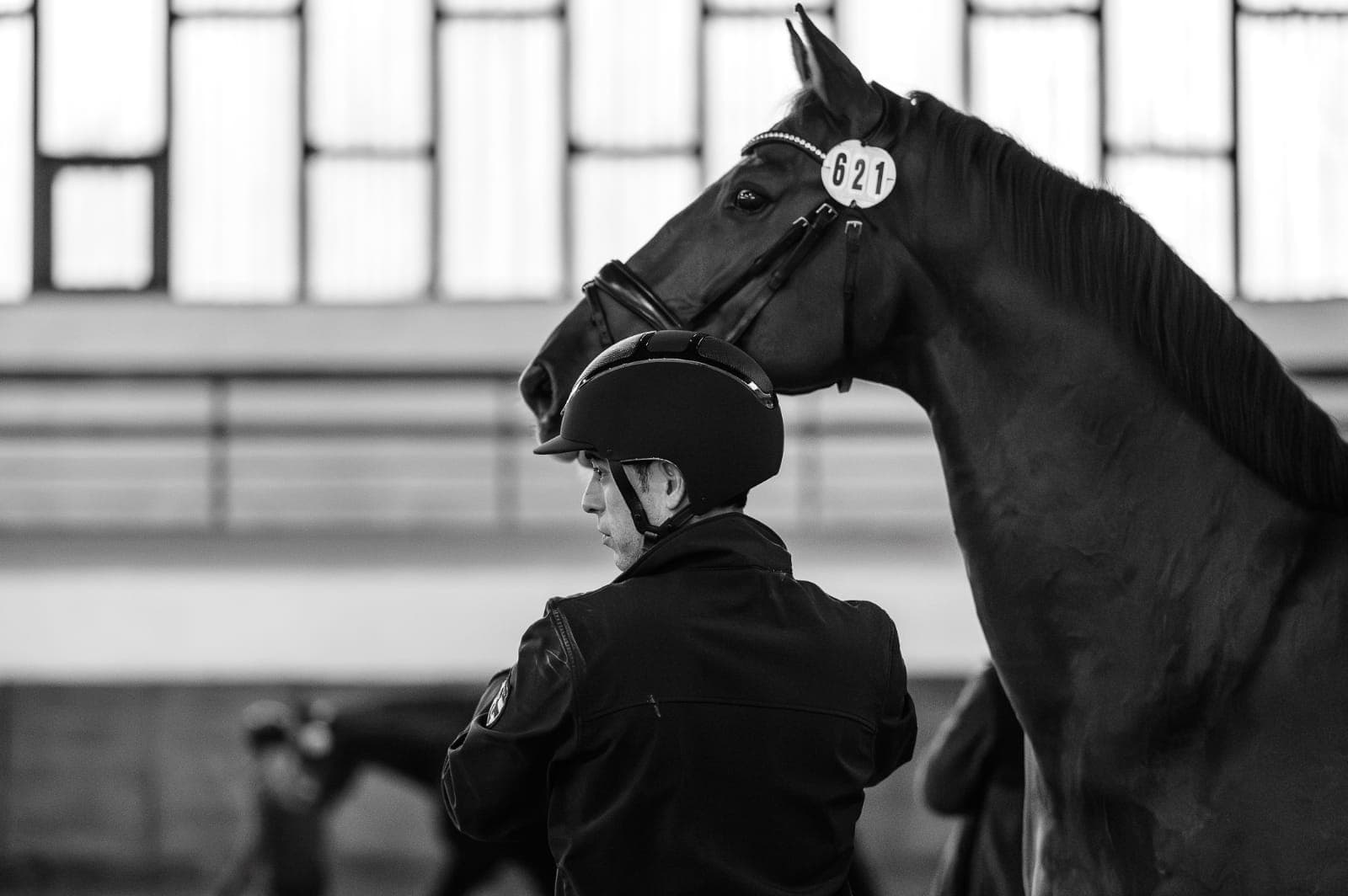 Unai Paredes — dramatic black and white portrait with horse